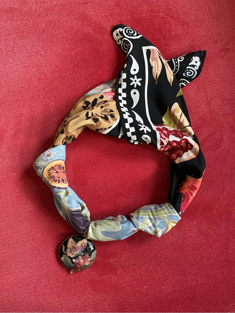 Gorgeous scarf with a vintage cloisonné round pendant.